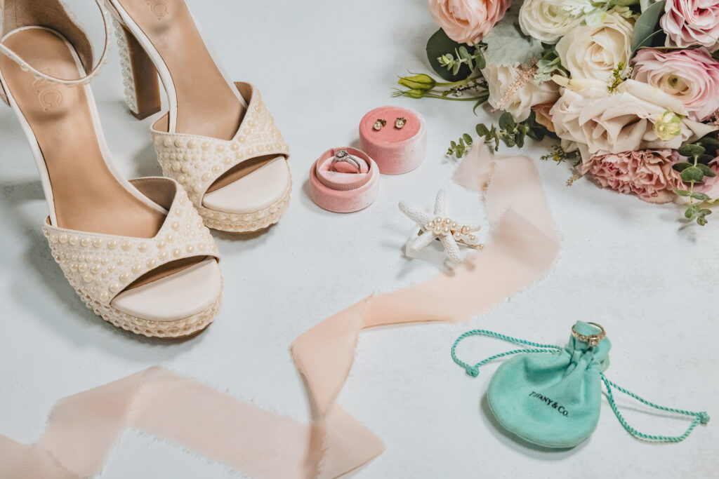 coastal chic bridal details flatlay