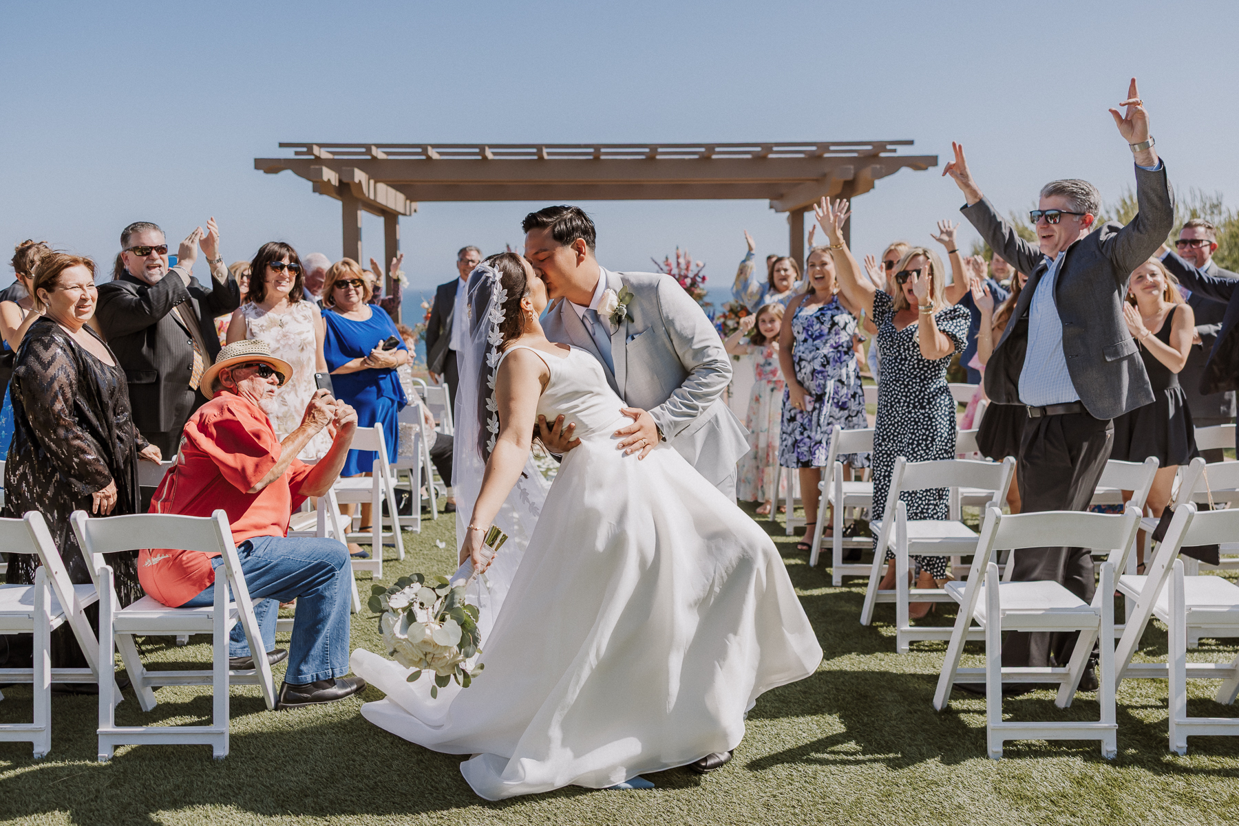 bride and groom dip kiss photo at the best wedding venue terranea resort at catalina point lawn