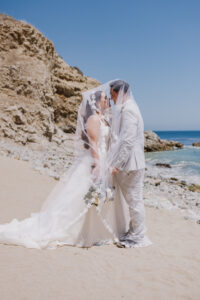 bride and groom portraits after groom first look at cove beach terranea resort.  One of the best south bay wedding venues..